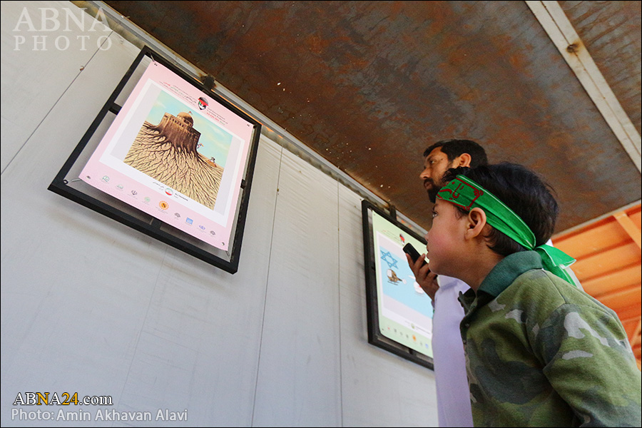 گزارش تصویری/ نمایشگاه آثار منتخب جشنواره بین المللی کاریکاتور روز جهانی قدس در قم 