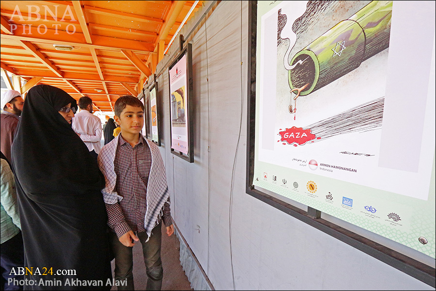 گزارش تصویری/ نمایشگاه آثار منتخب جشنواره بین المللی کاریکاتور روز جهانی قدس در قم 
